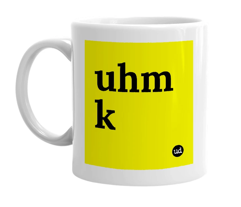 White mug with 'uhm k' in bold black letters