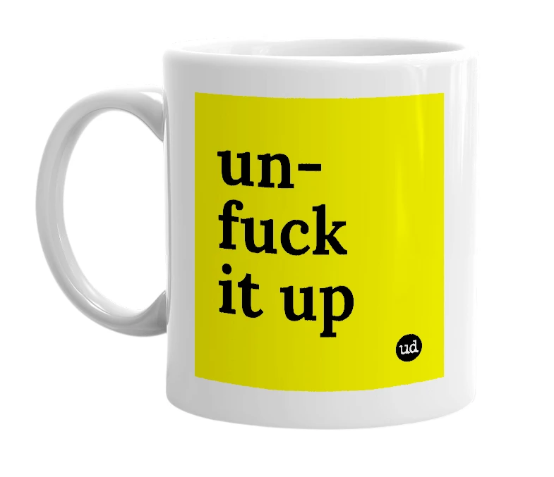 White mug with 'un-fuck it up' in bold black letters