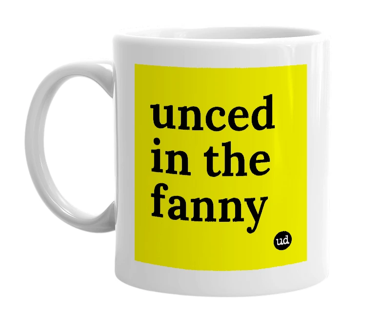 White mug with 'unced in the fanny' in bold black letters