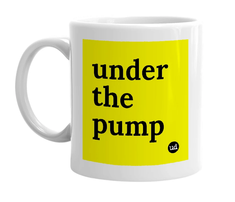 White mug with 'under the pump' in bold black letters