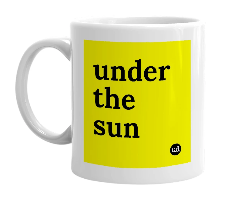 White mug with 'under the sun' in bold black letters