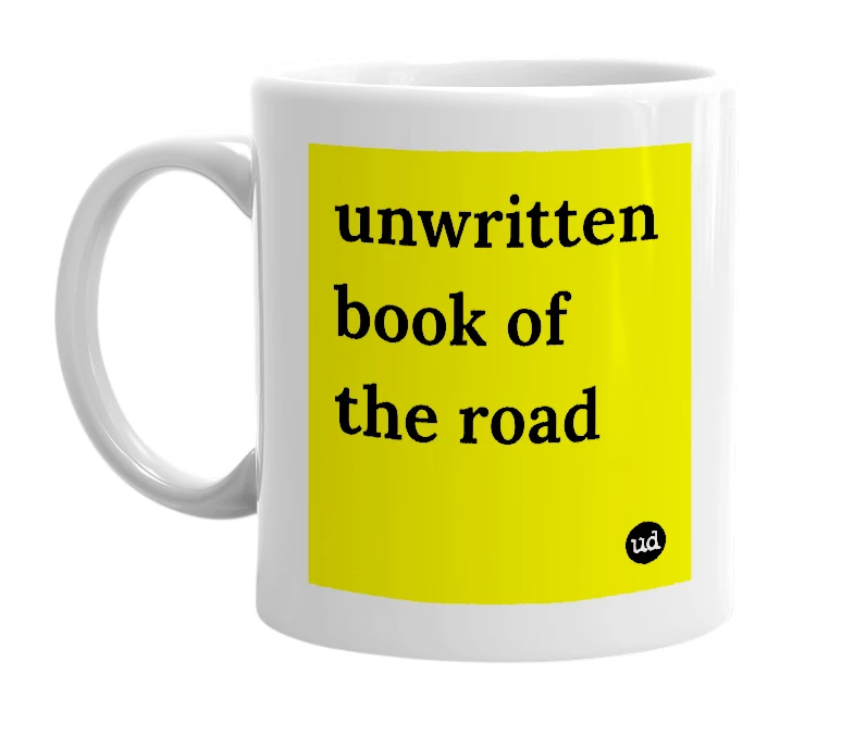 White mug with 'unwritten book of the road' in bold black letters