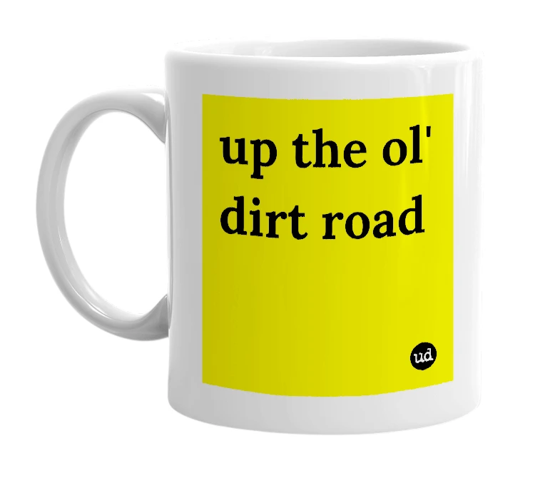 White mug with 'up the ol' dirt road' in bold black letters