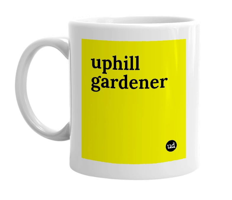 White mug with 'uphill gardener' in bold black letters