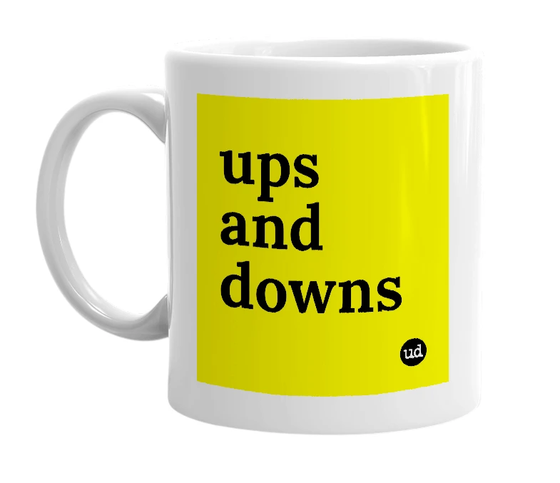 White mug with 'ups and downs' in bold black letters