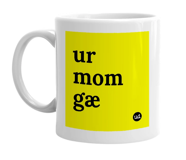 White mug with 'ur mom gæ' in bold black letters