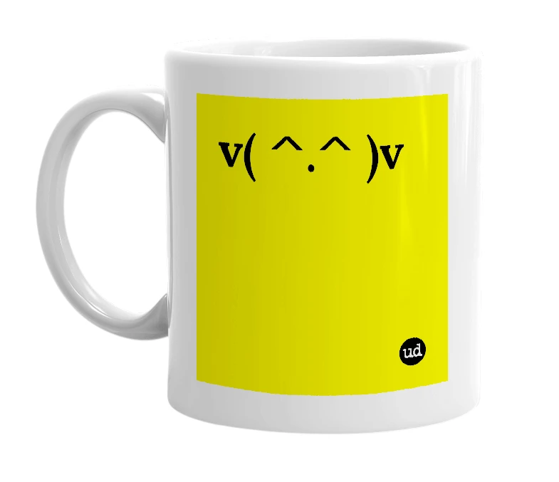 White mug with 'v( ^.^ )v' in bold black letters