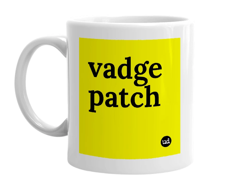 White mug with 'vadge patch' in bold black letters