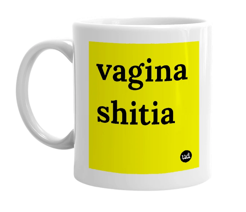 White mug with 'vagina shitia' in bold black letters