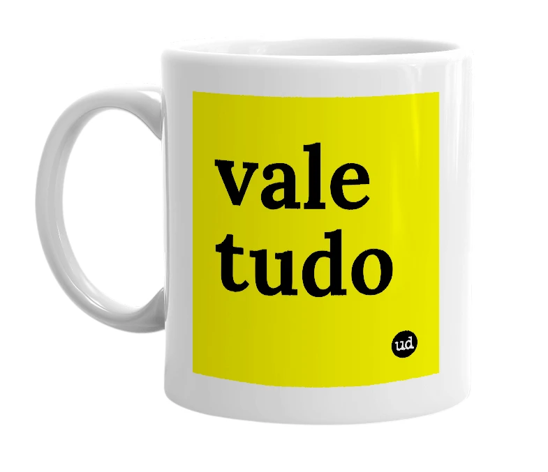 White mug with 'vale tudo' in bold black letters