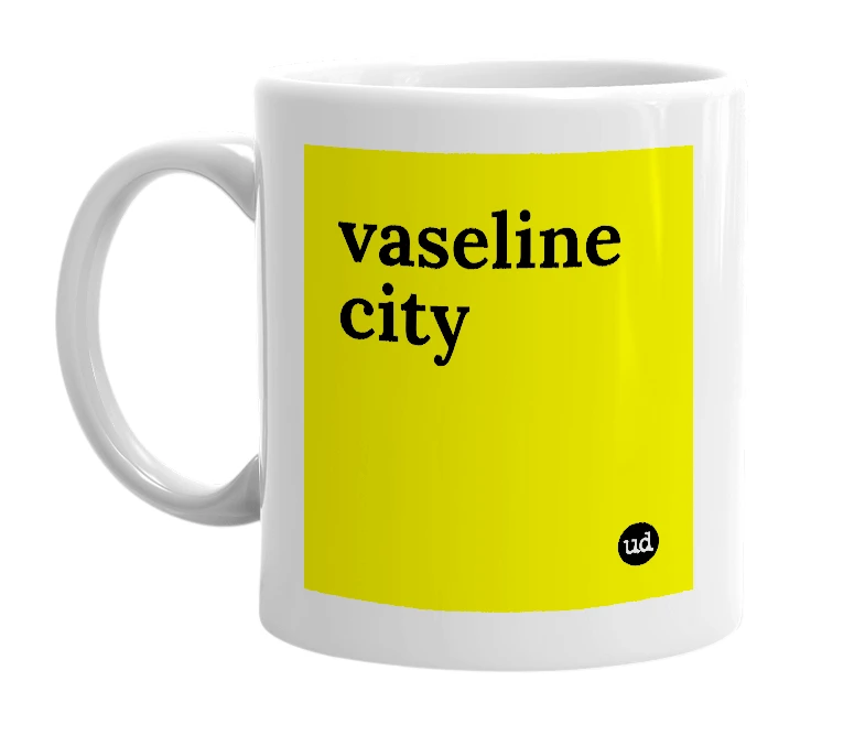White mug with 'vaseline city' in bold black letters