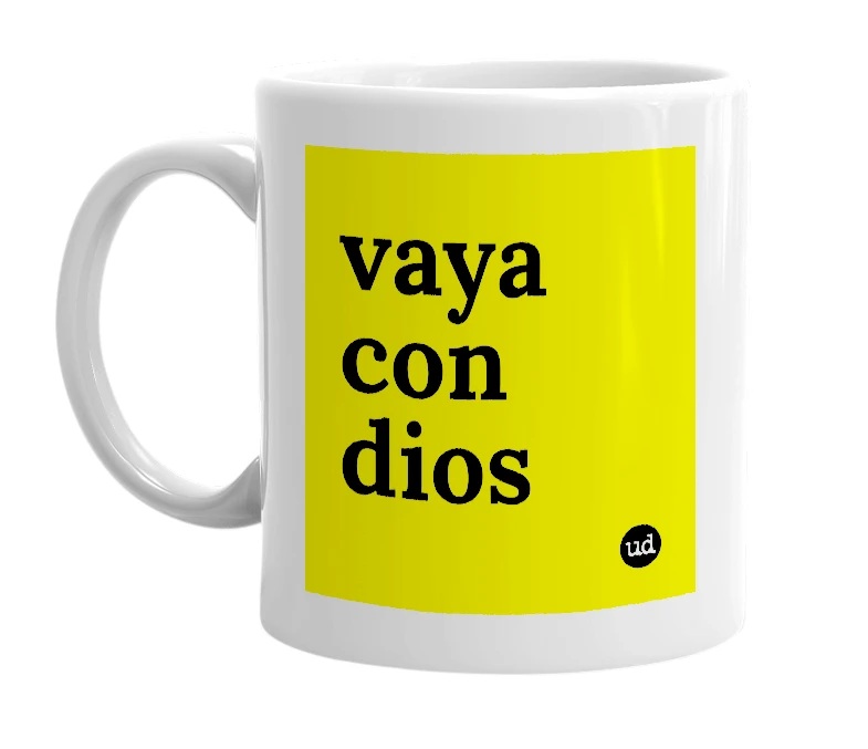 White mug with 'vaya con dios' in bold black letters