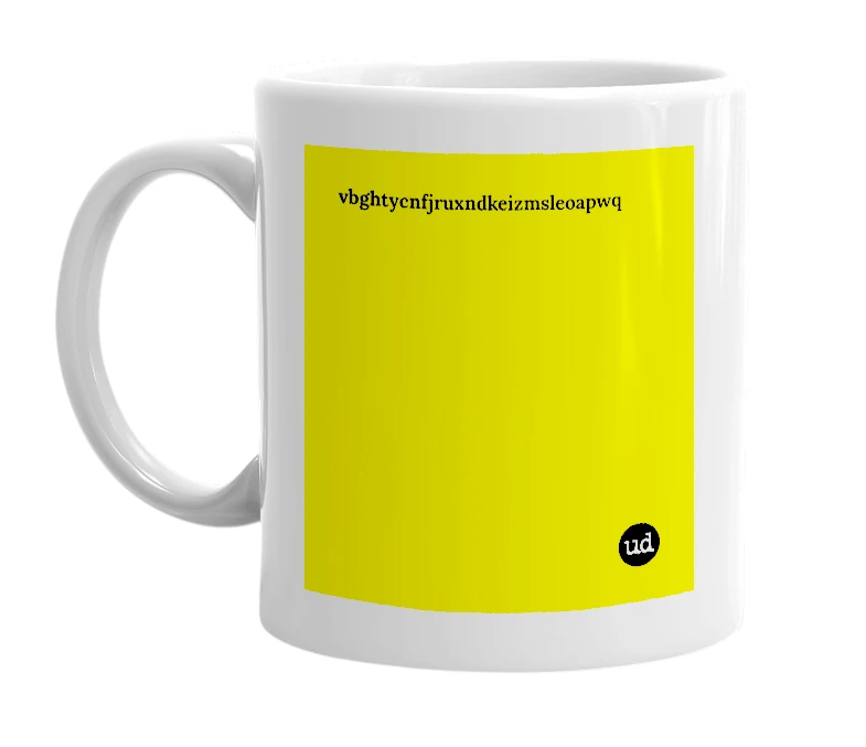 White mug with 'vbghtycnfjruxndkeizmsleoapwq' in bold black letters
