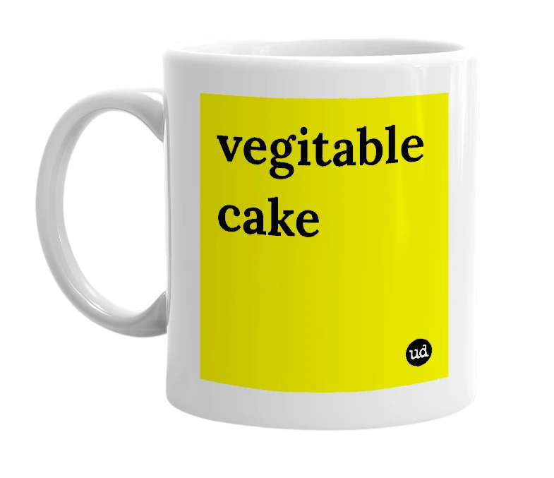 White mug with 'vegitable cake' in bold black letters