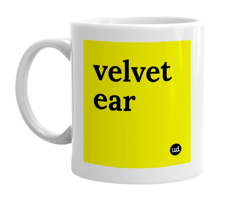 White mug with 'velvet ear' in bold black letters