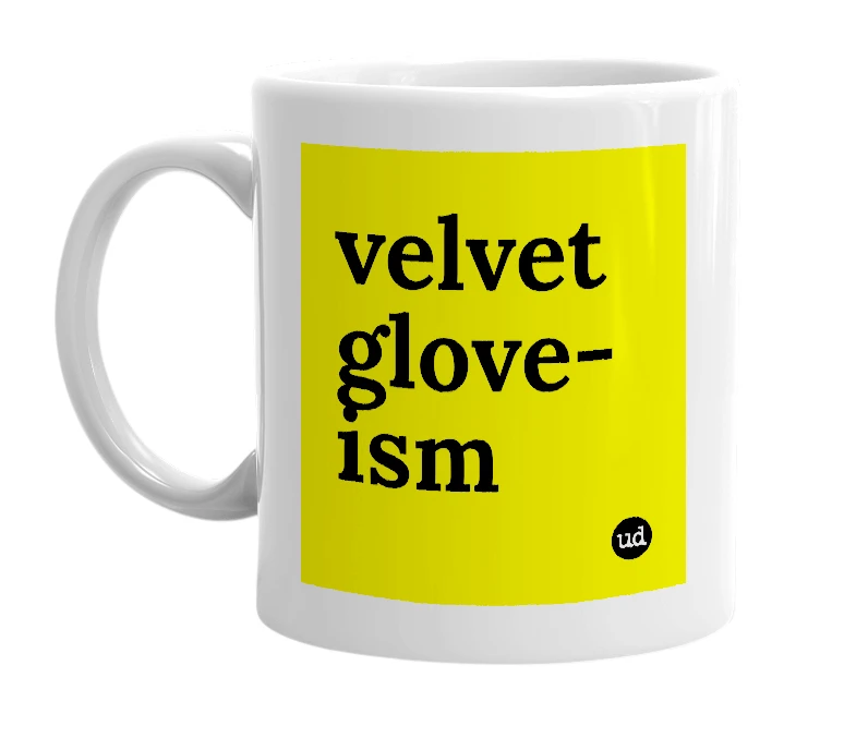 White mug with 'velvet glove-ism' in bold black letters