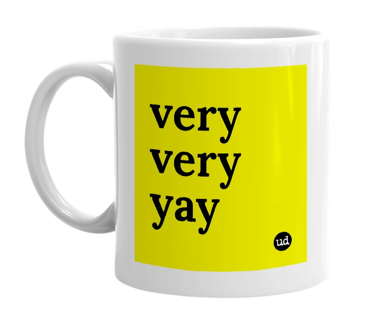 White mug with 'very very yay' in bold black letters