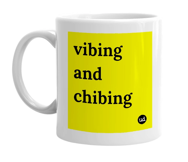White mug with 'vibing and chibing' in bold black letters