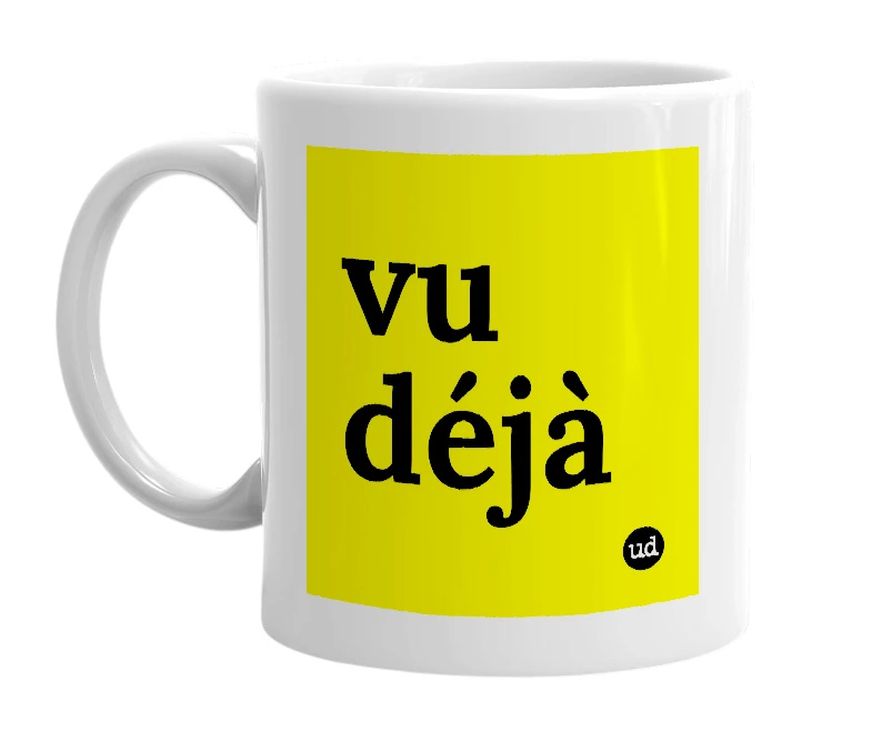 White mug with 'vu déjà' in bold black letters