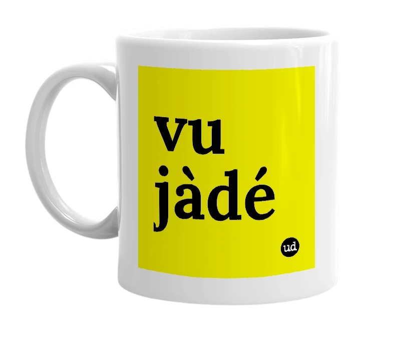 White mug with 'vu jàdé' in bold black letters