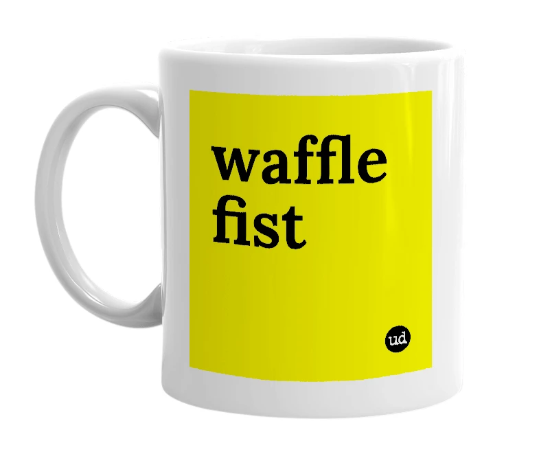 White mug with 'waffle fist' in bold black letters