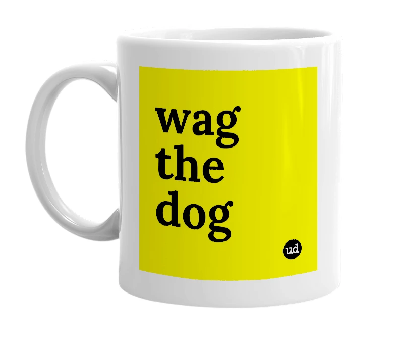 White mug with 'wag the dog' in bold black letters