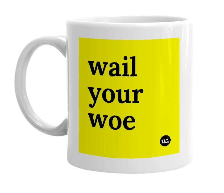 White mug with 'wail your woe' in bold black letters