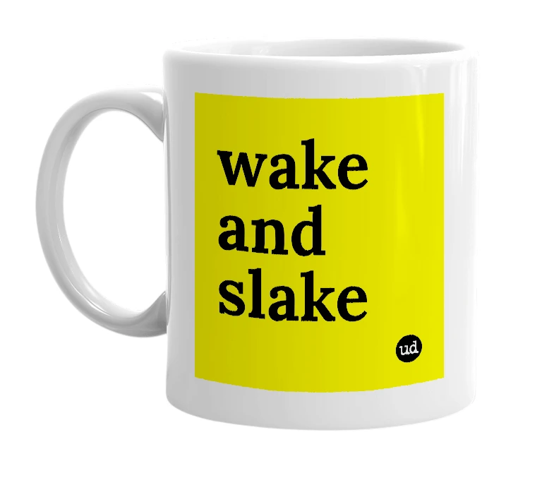 White mug with 'wake and slake' in bold black letters