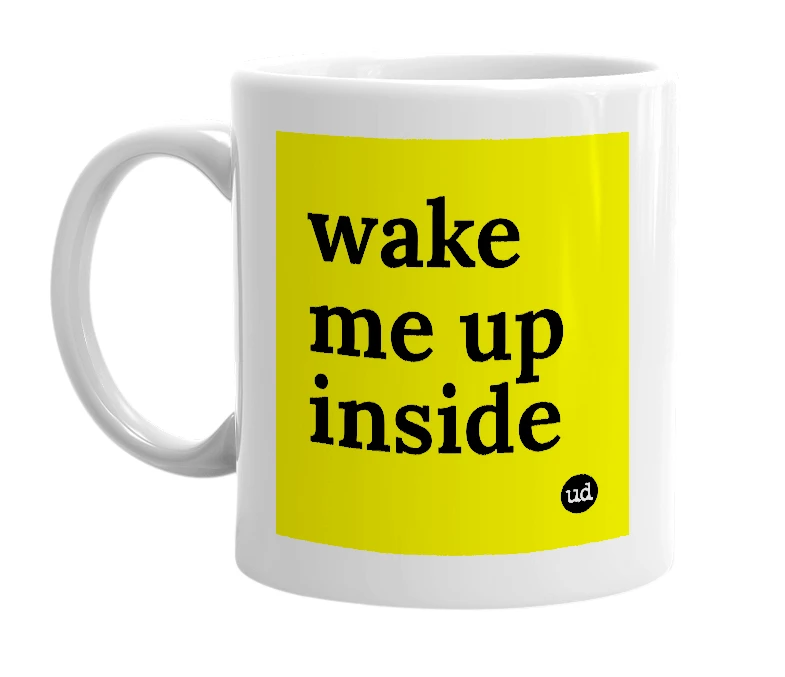 White mug with 'wake me up inside' in bold black letters