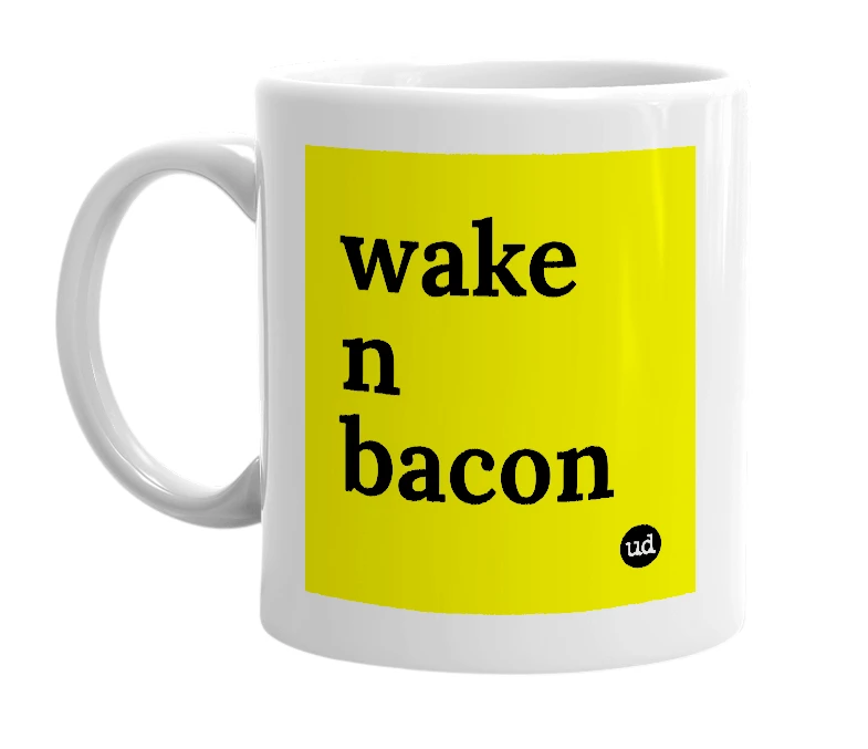 White mug with 'wake n bacon' in bold black letters