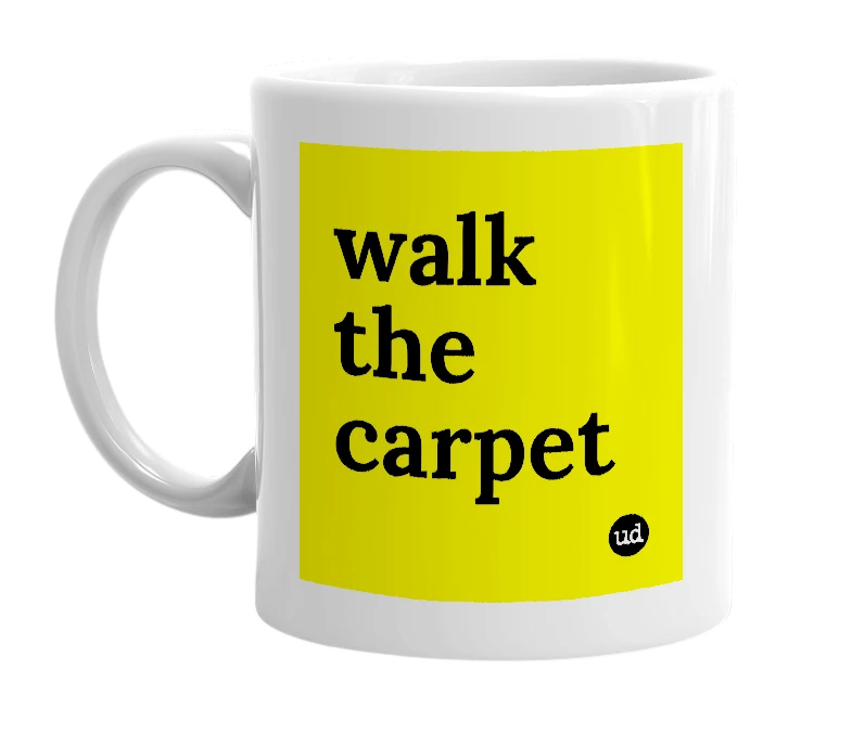 White mug with 'walk the carpet' in bold black letters