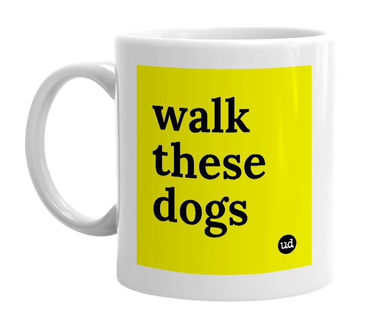 White mug with 'walk these dogs' in bold black letters