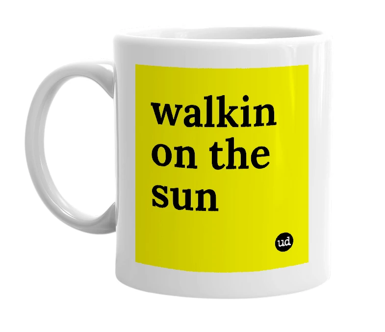 White mug with 'walkin on the sun' in bold black letters