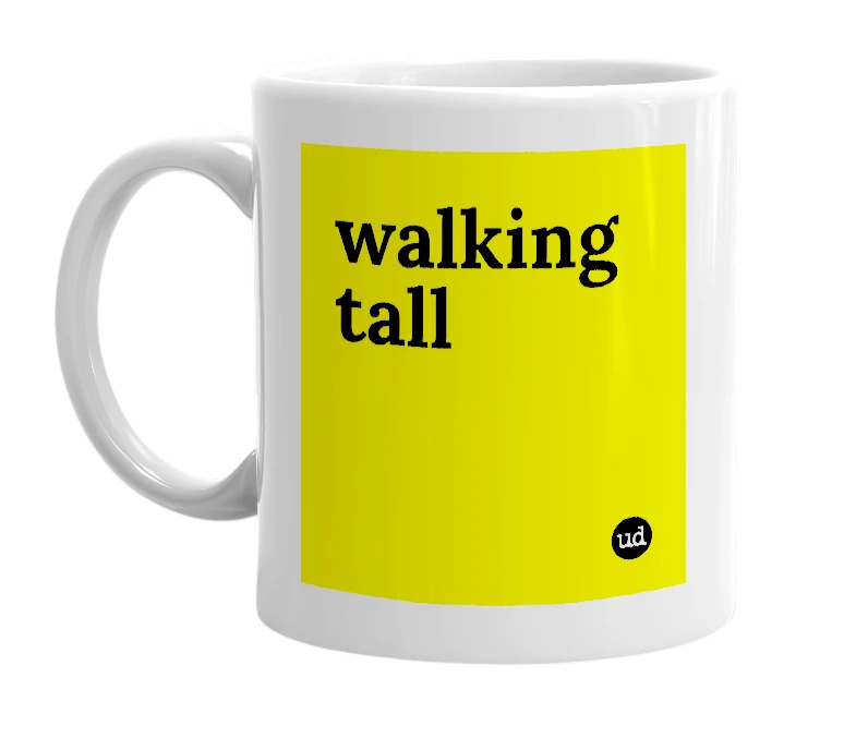 White mug with 'walking tall' in bold black letters