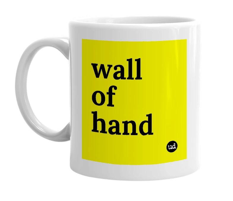 White mug with 'wall of hand' in bold black letters