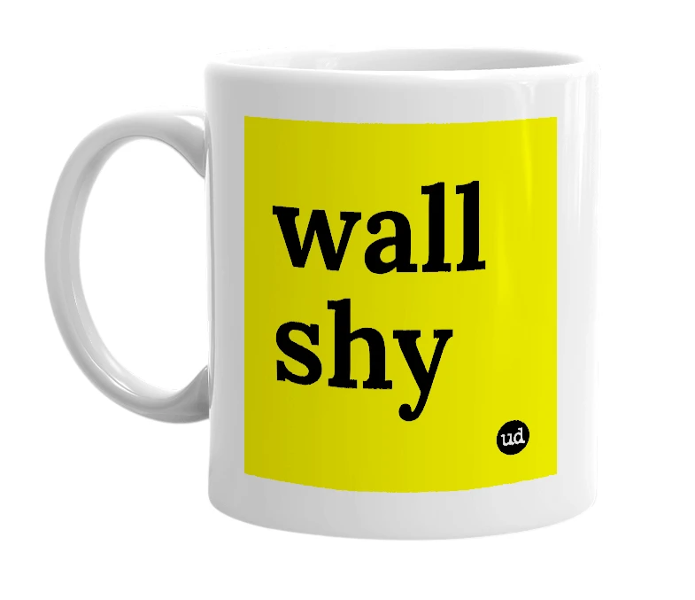 White mug with 'wall shy' in bold black letters