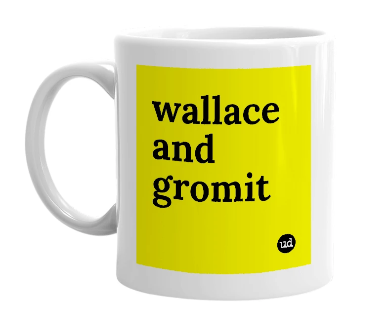 White mug with 'wallace and gromit' in bold black letters