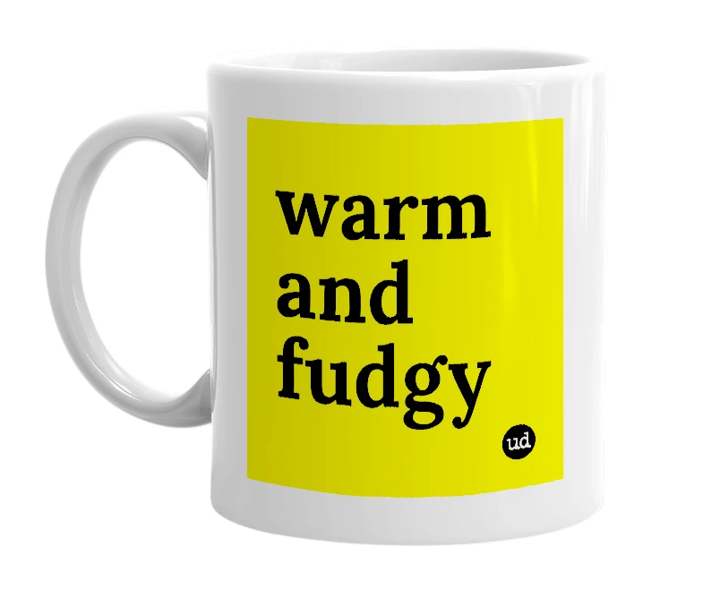 White mug with 'warm and fudgy' in bold black letters