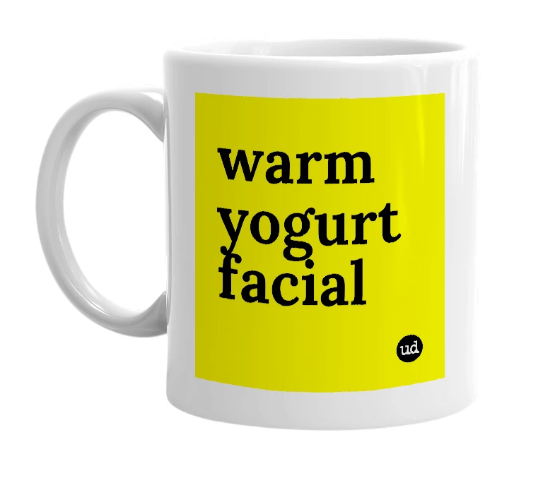 White mug with 'warm yogurt facial' in bold black letters