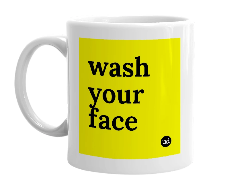 White mug with 'wash your face' in bold black letters