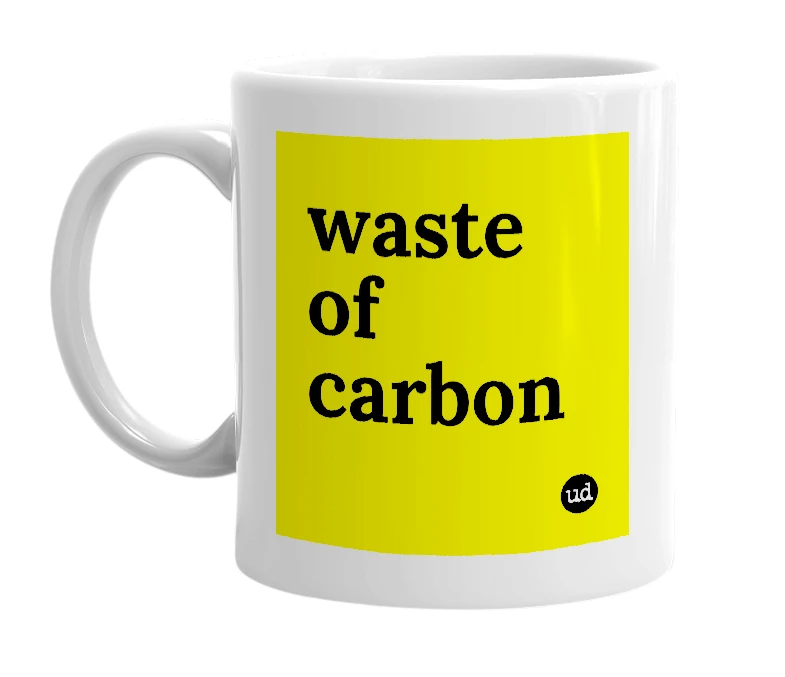 White mug with 'waste of carbon' in bold black letters