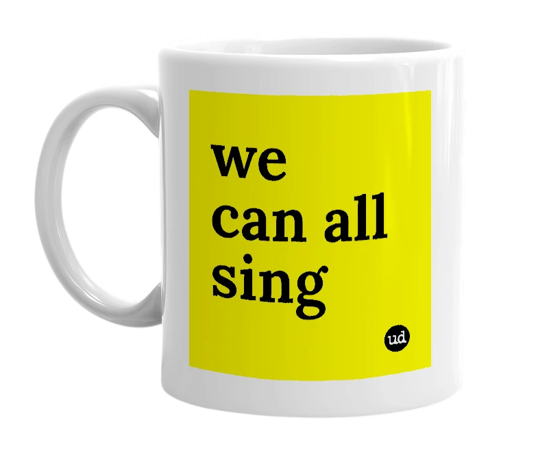 White mug with 'we can all sing' in bold black letters