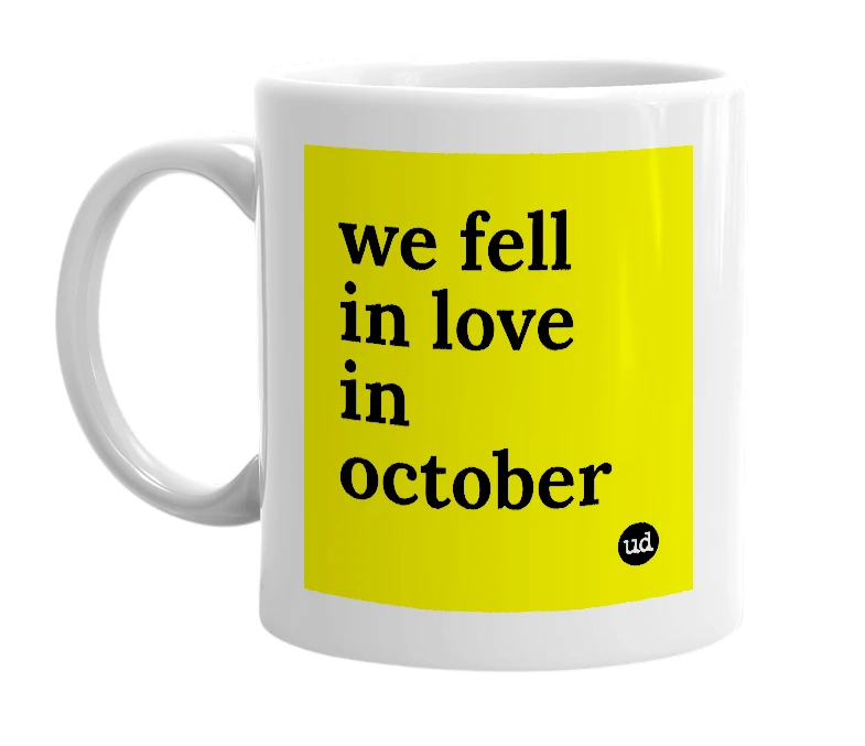 White mug with 'we fell in love in october' in bold black letters