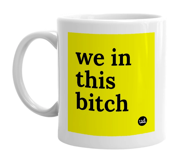 White mug with 'we in this bitch' in bold black letters