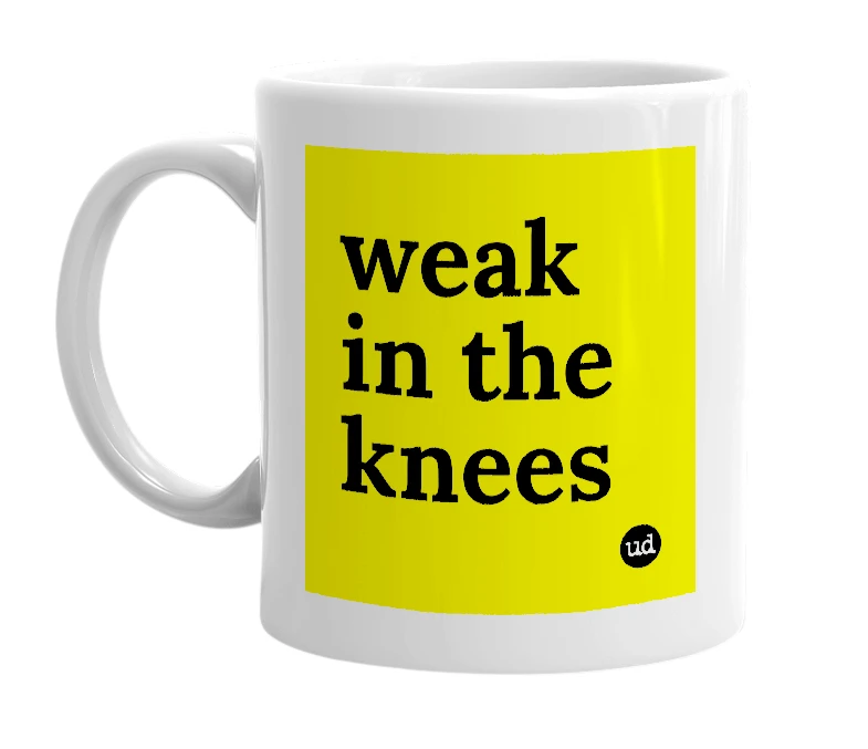 White mug with 'weak in the knees' in bold black letters