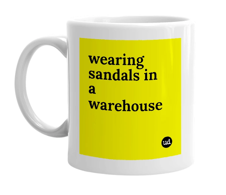 White mug with 'wearing sandals in a warehouse' in bold black letters