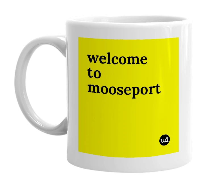 White mug with 'welcome to mooseport' in bold black letters