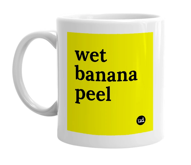 White mug with 'wet banana peel' in bold black letters