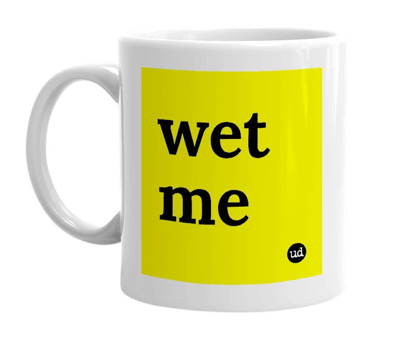 White mug with 'wet me' in bold black letters