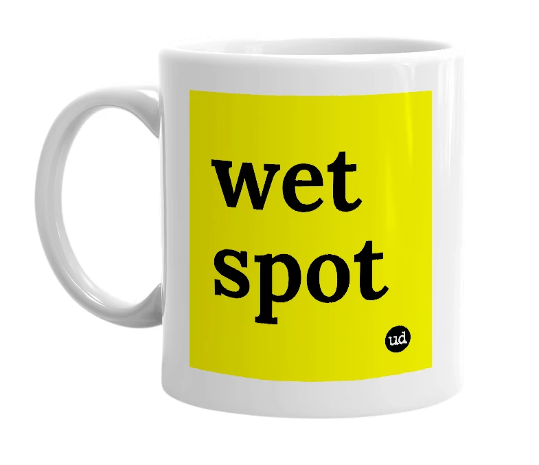 White mug with 'wet spot' in bold black letters